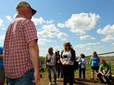 farmer talking to group